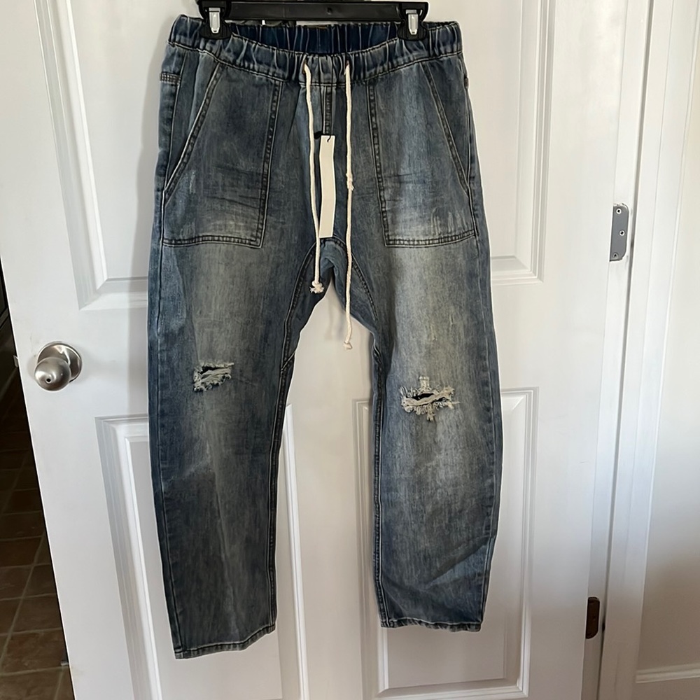 Mustard Seed ripped jeans purchased at Vici Collection